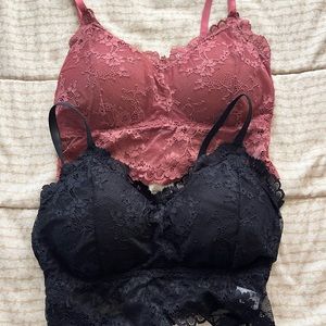 Pink and black lace bralettes